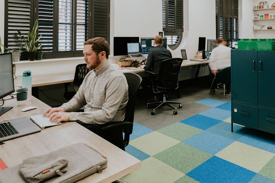 Web Developers working in an office